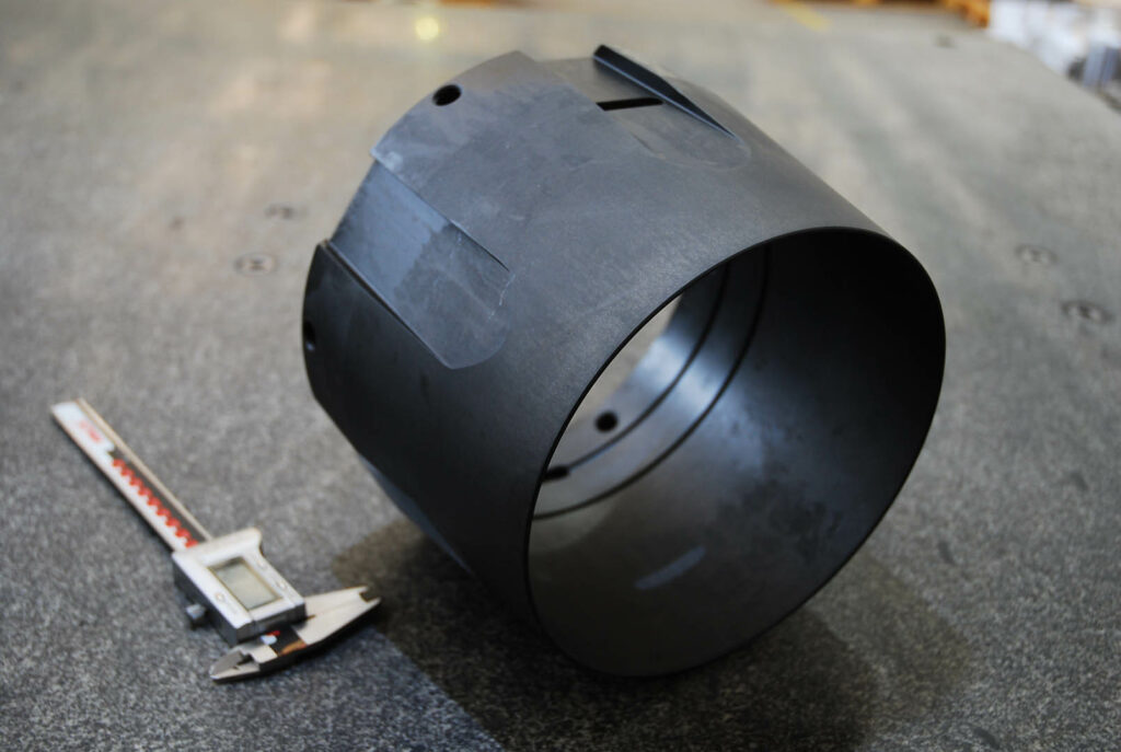 Black coated pipeline cylinder with digital caliper, used in oil and gas