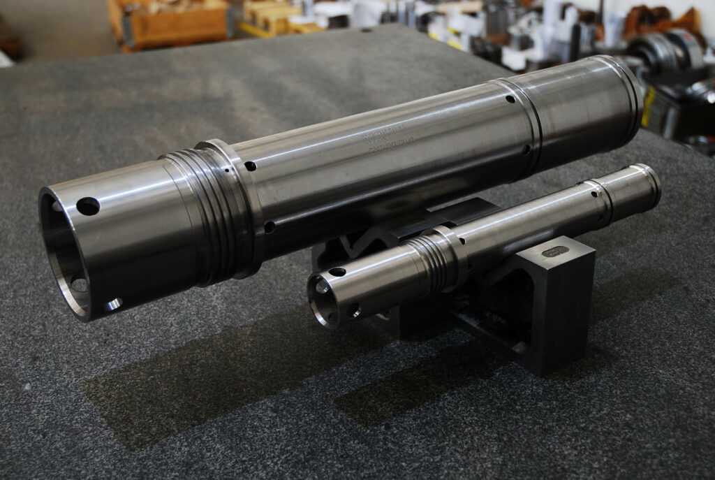 Threaded shaft components for oil and gas equipment on inspection table